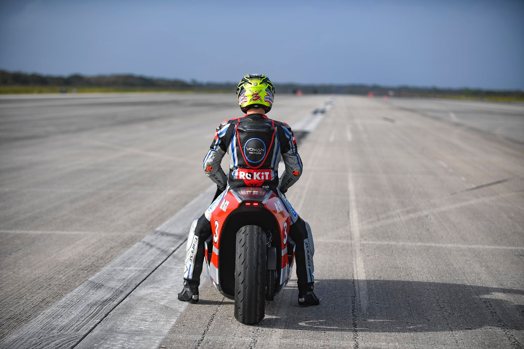 A view of the Voxan team working at and successfully blasting through 21 electric motorcycle speed records on Space Florida’s Launch and Landing Facility