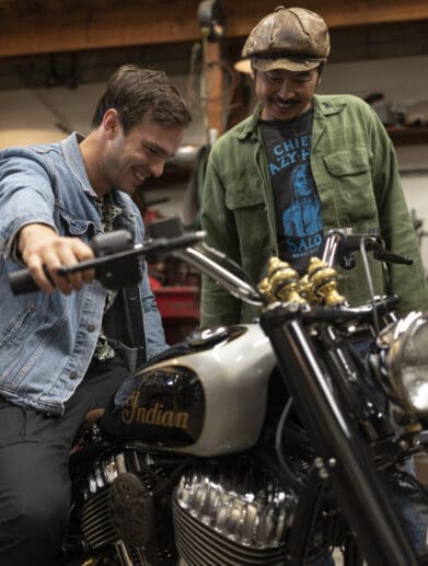 Gō Takamine with Nicolas Hoult next to the new Brat Style bobber from Inaidn Motorcycles that Takamine modded out for the movie star