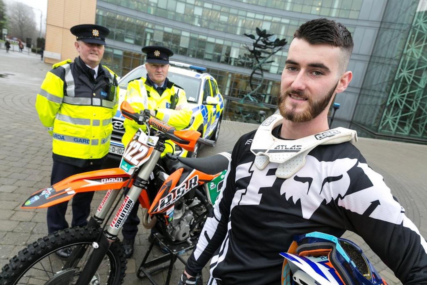 A view o fa rider and policemen in Dublin dealing with the crisis of hooligans on their scramblers