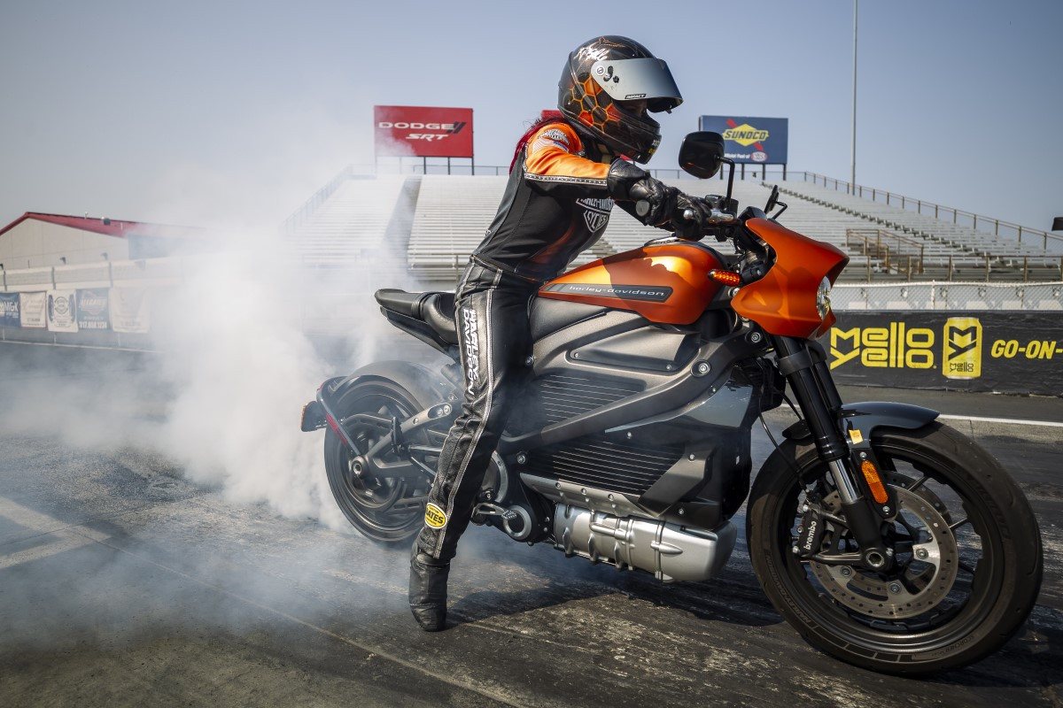 A view of a. rider trying out the LiveWire One on a track