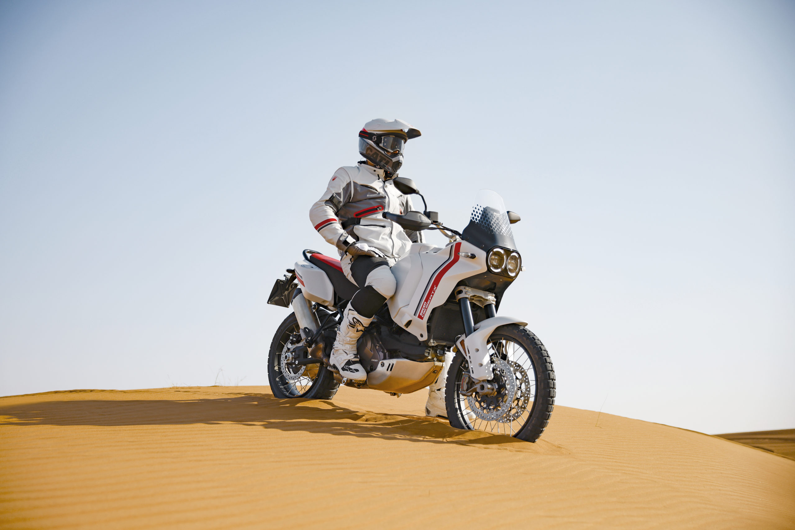 A view of the Ducati DesertX being ridden in the desert