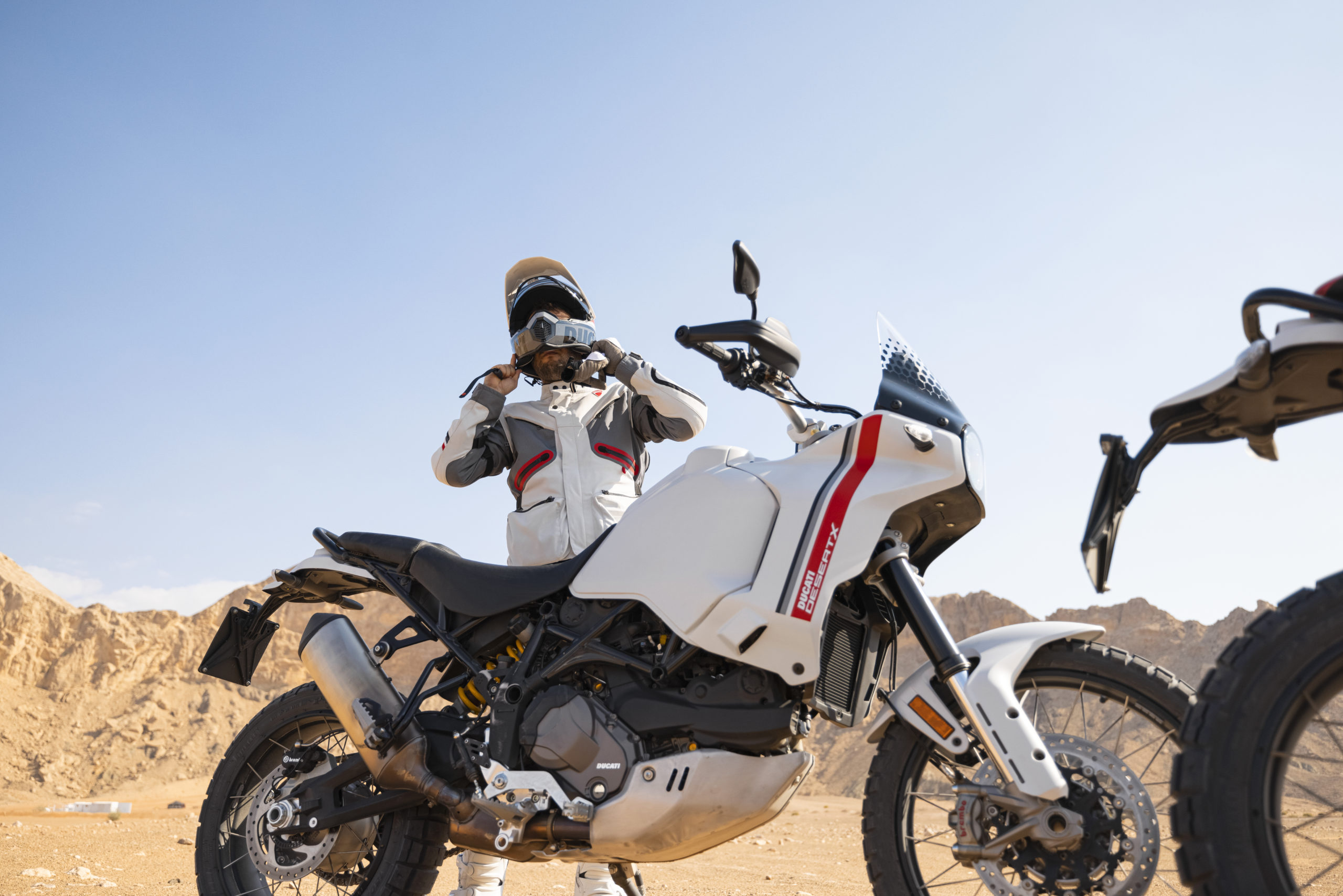 A view of the Ducati DesertX being ridden in the desert