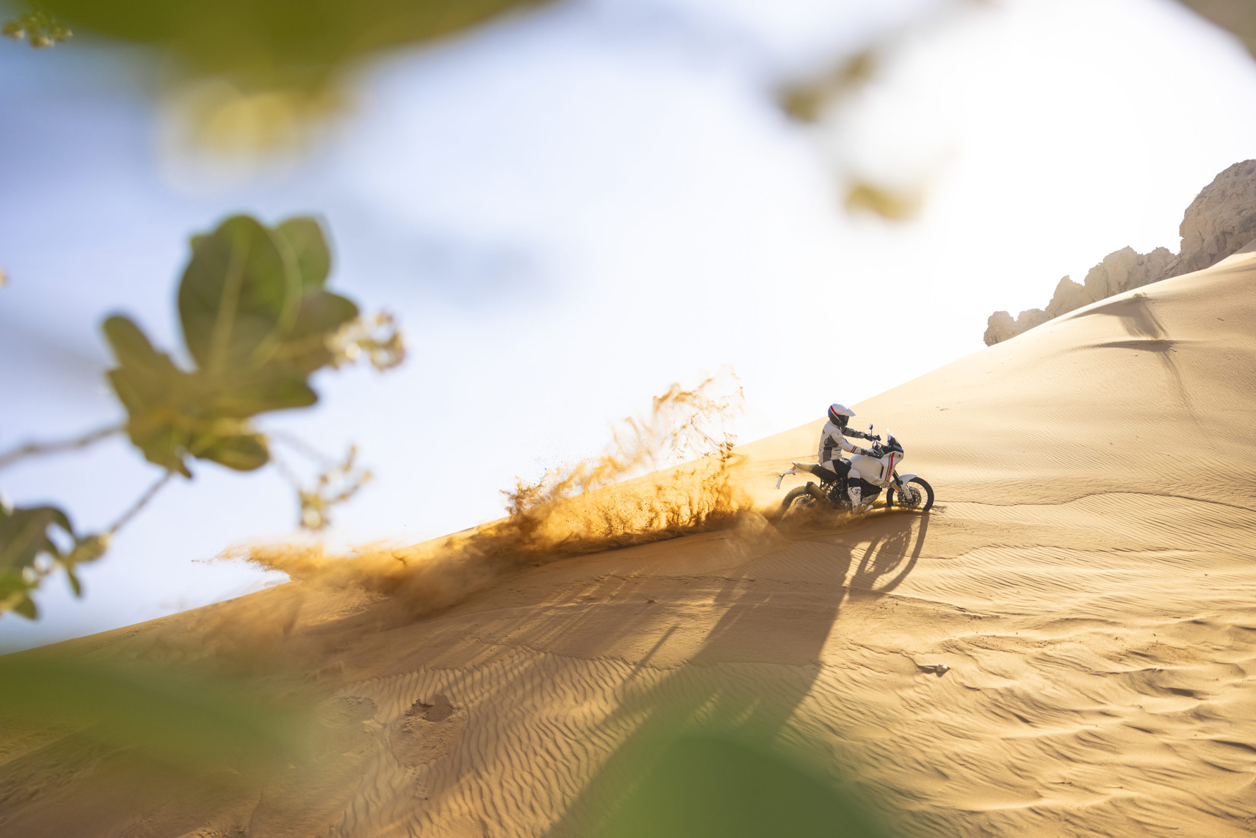 A view of the Ducati DesertX being ridden in the desert