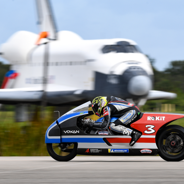 A view of the Voxan team working at and successfully blasting through 21 electric motorcycle speed records on Space Florida’s Launch and Landing Facility