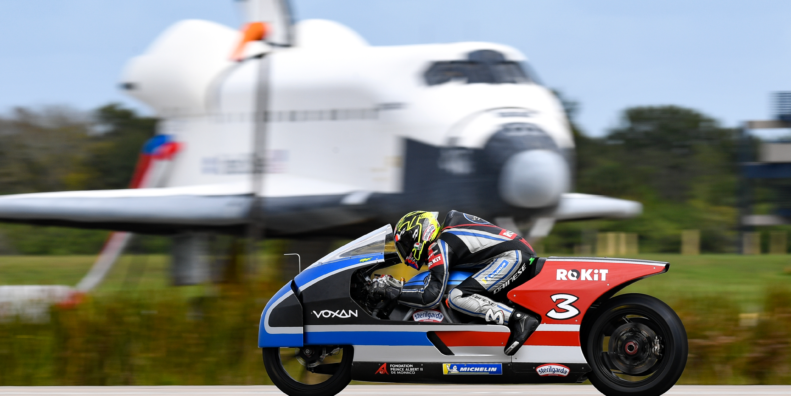 A view of the Voxan team working at and successfully blasting through 21 electric motorcycle speed records on Space Florida’s Launch and Landing Facility