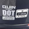 Labels showing safety certifications on Quin Quest Smart Helmet