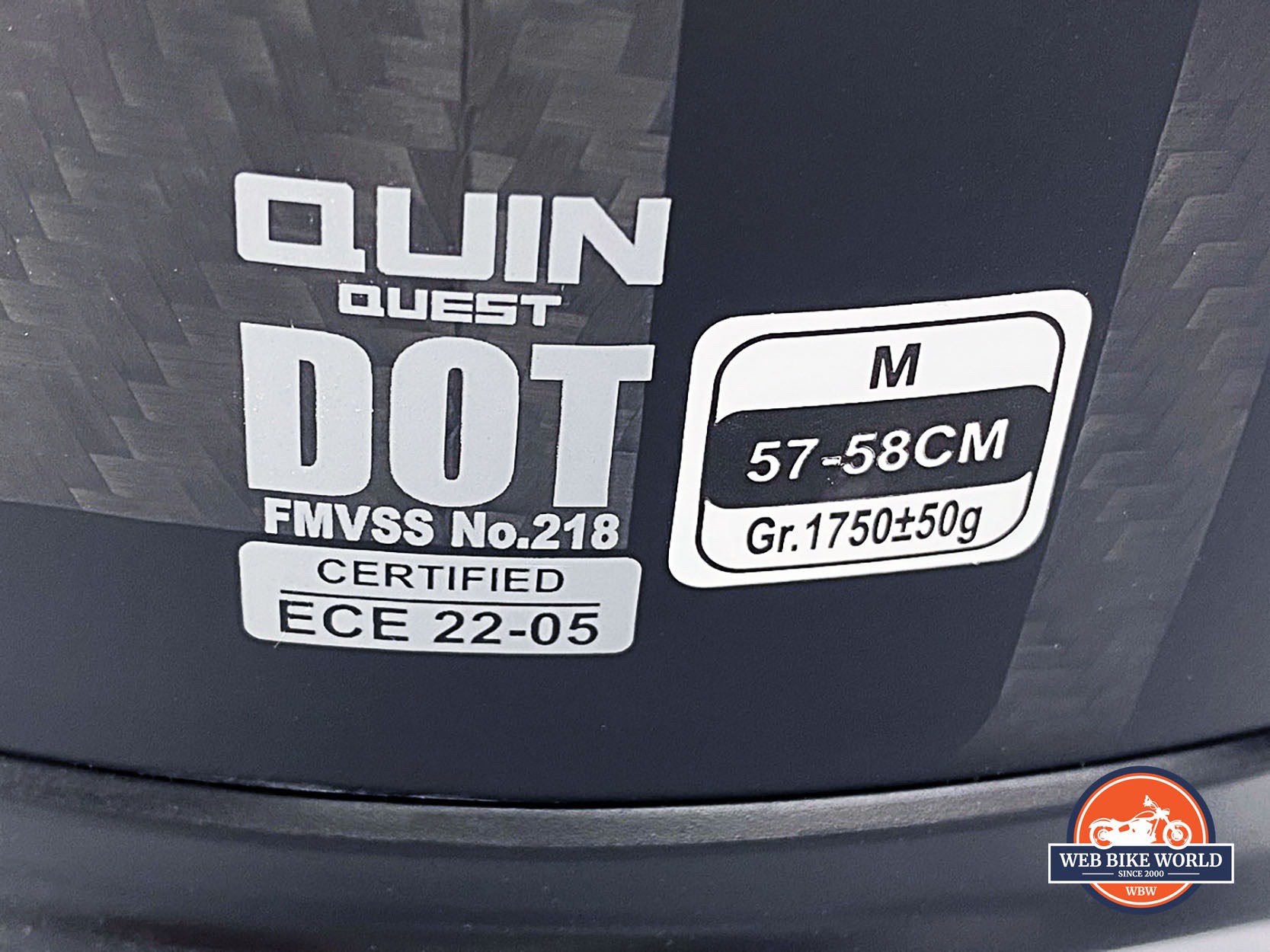 Labels showing safety certifications on Quin Quest Smart Helmet