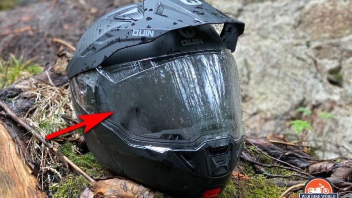 Quin Quest Smart Helmet with foggy visor in forest