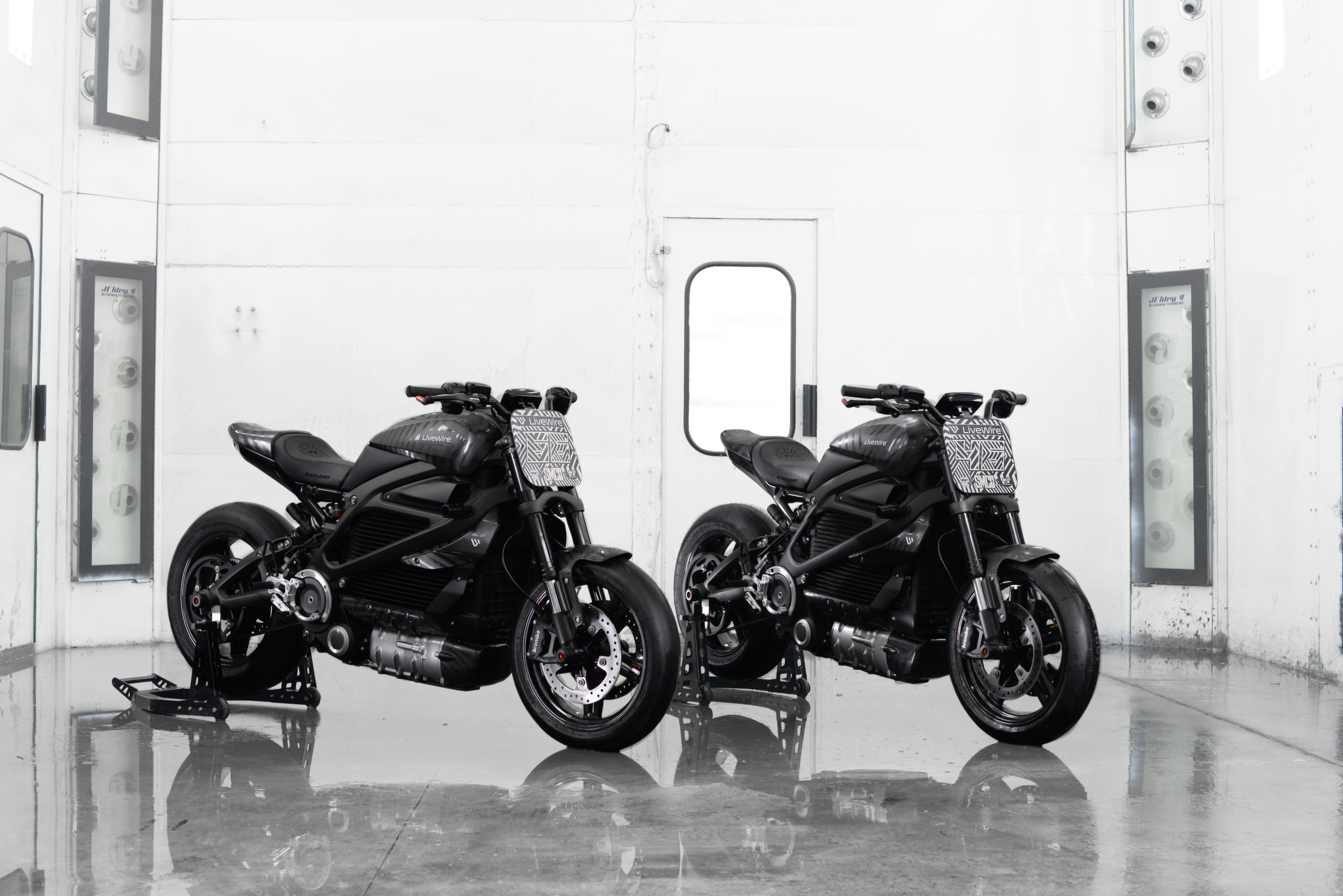 A view of the three electric motorcycles held at Autopia 2099: SMCO's flat-tracker-inspired LiveWire Ones