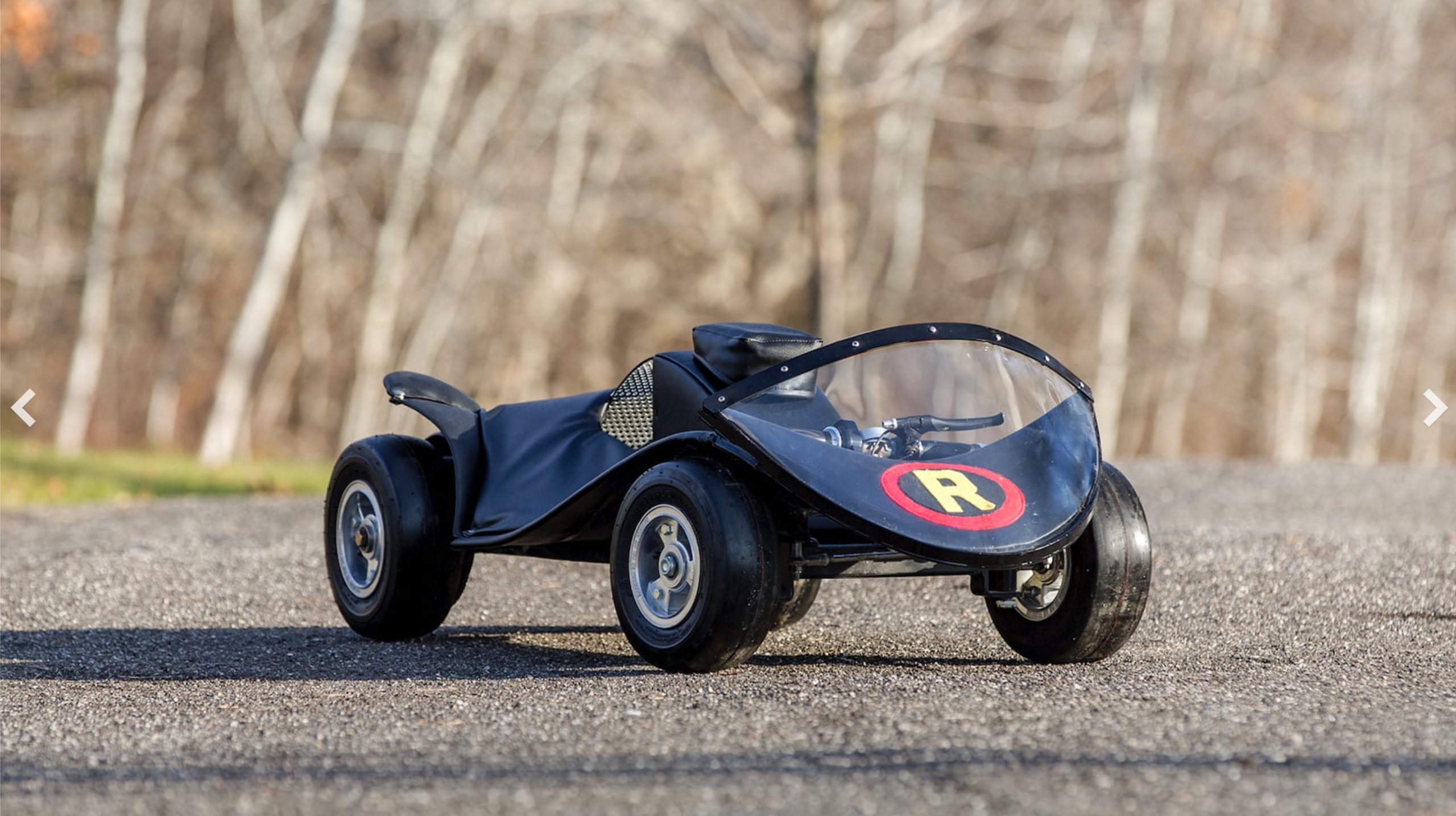 The Replica BatCycle about to go on auction, complete with Robin Go-Cart sidekick unit