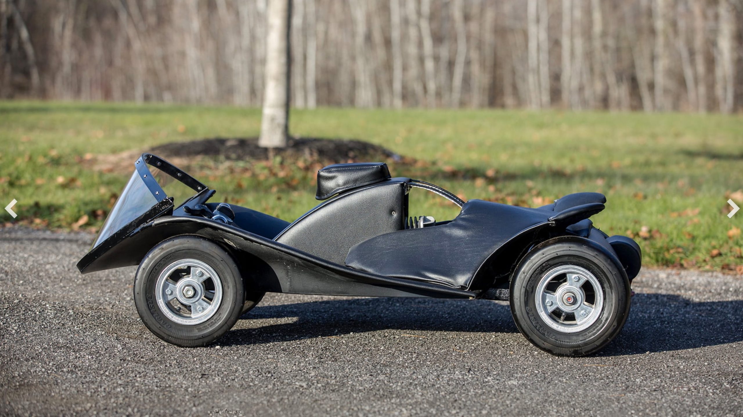 The Replica BatCycle about to go on auction, complete with Robin Go-Cart sidekick unit