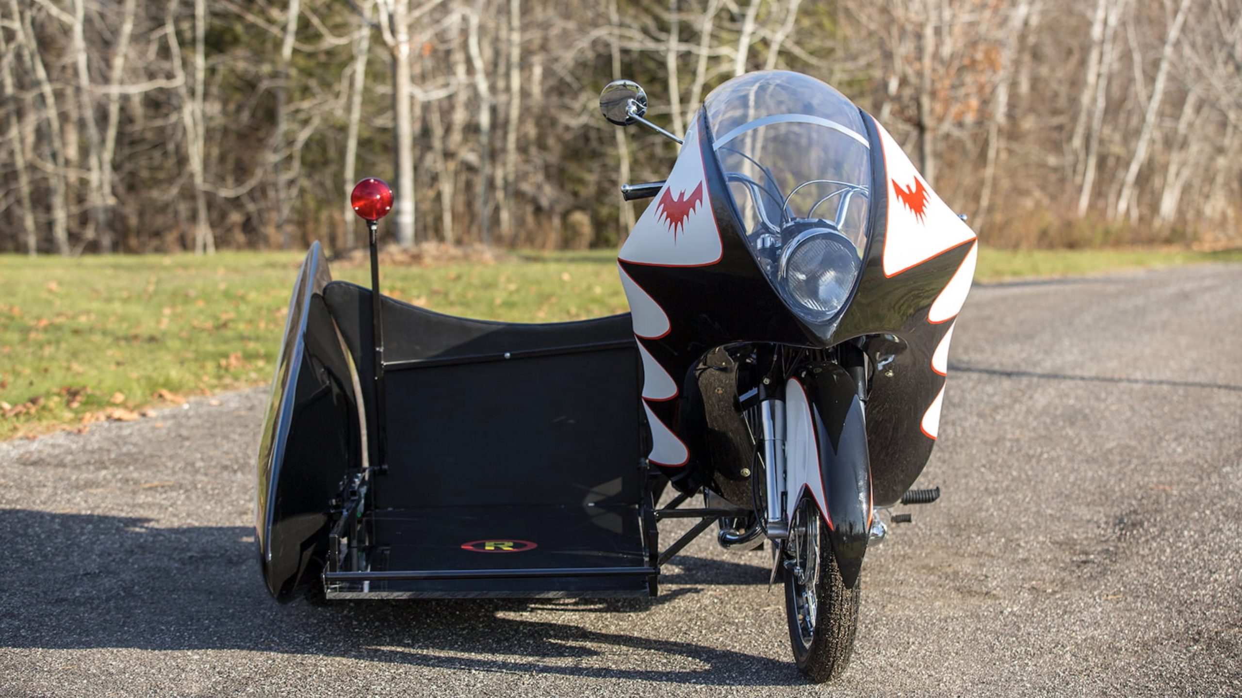 The Replica BatCycle about to go on auction, complete with Robin Go-Cart sidekick unit