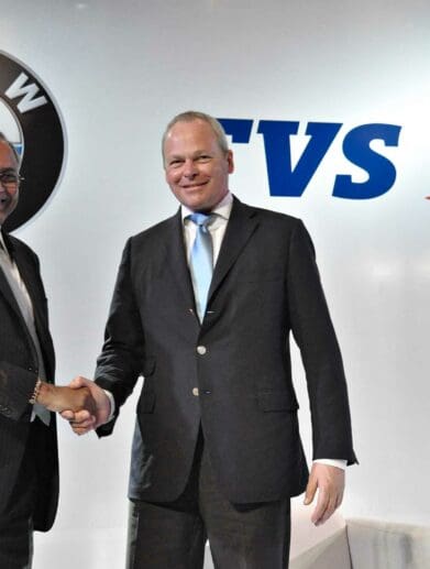 A view of the BMW and TVS logos together, in symbolism of the upcoming partnership between the two companies