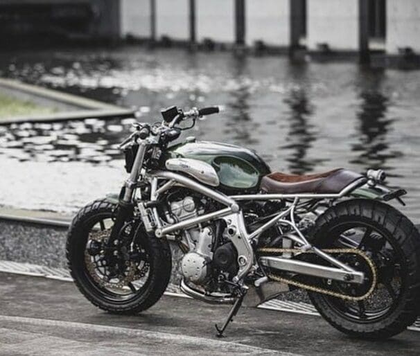 A 2006 Kawasaki ER-6F that's been tricked out with a retro, cafe racer flair