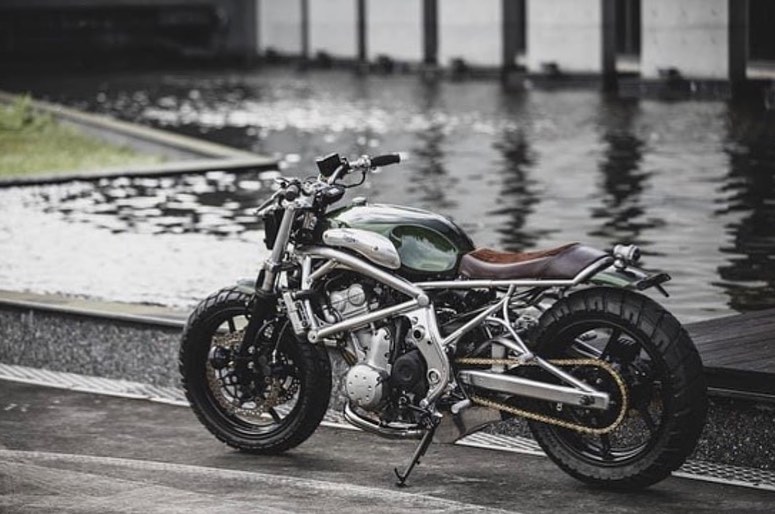 A 2006 Kawasaki ER-6F that's been tricked out with a retro, cafe racer flair