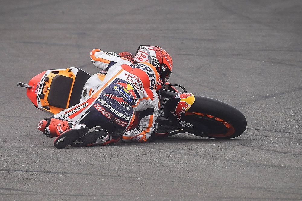 A view of Marc Marquez racing for Team Honda and sustaining a crash