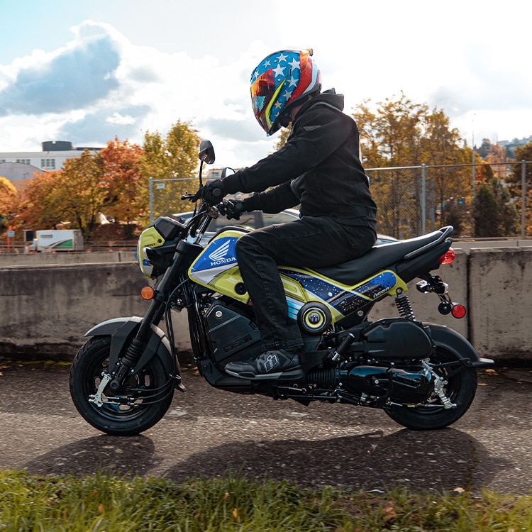 A side view of the Honda Navi, courtesy of Honda's official website