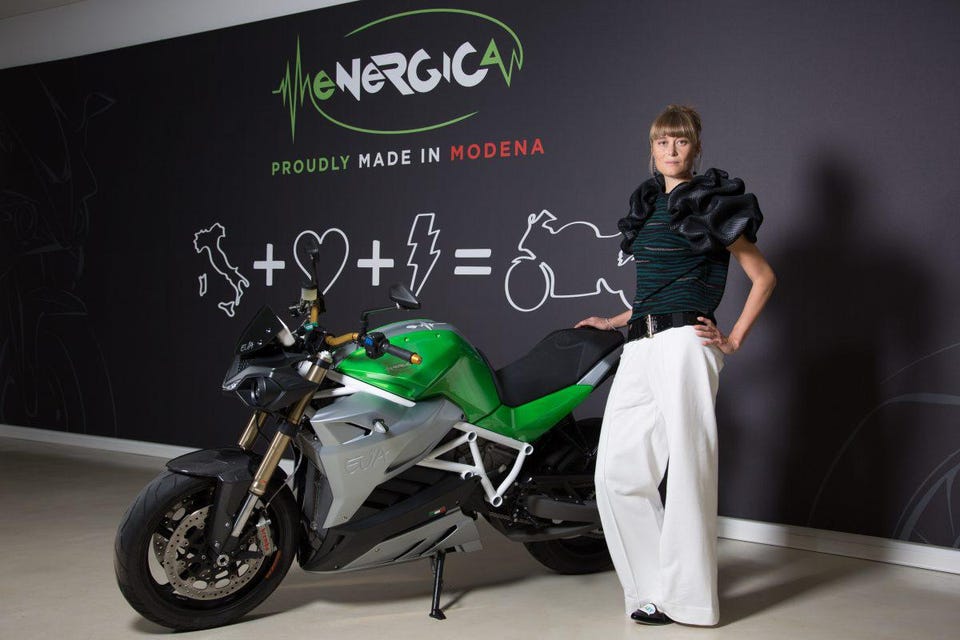 Energica's CEO next to one of her super bikes