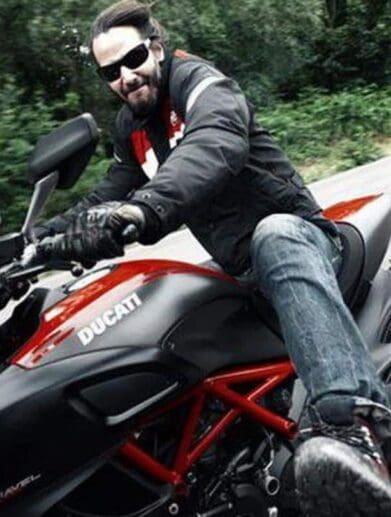 Keanu Reeves with his vehicles