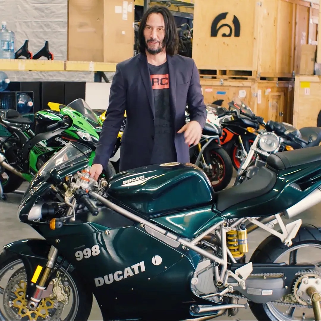 Keanu Reeves with his vehicles