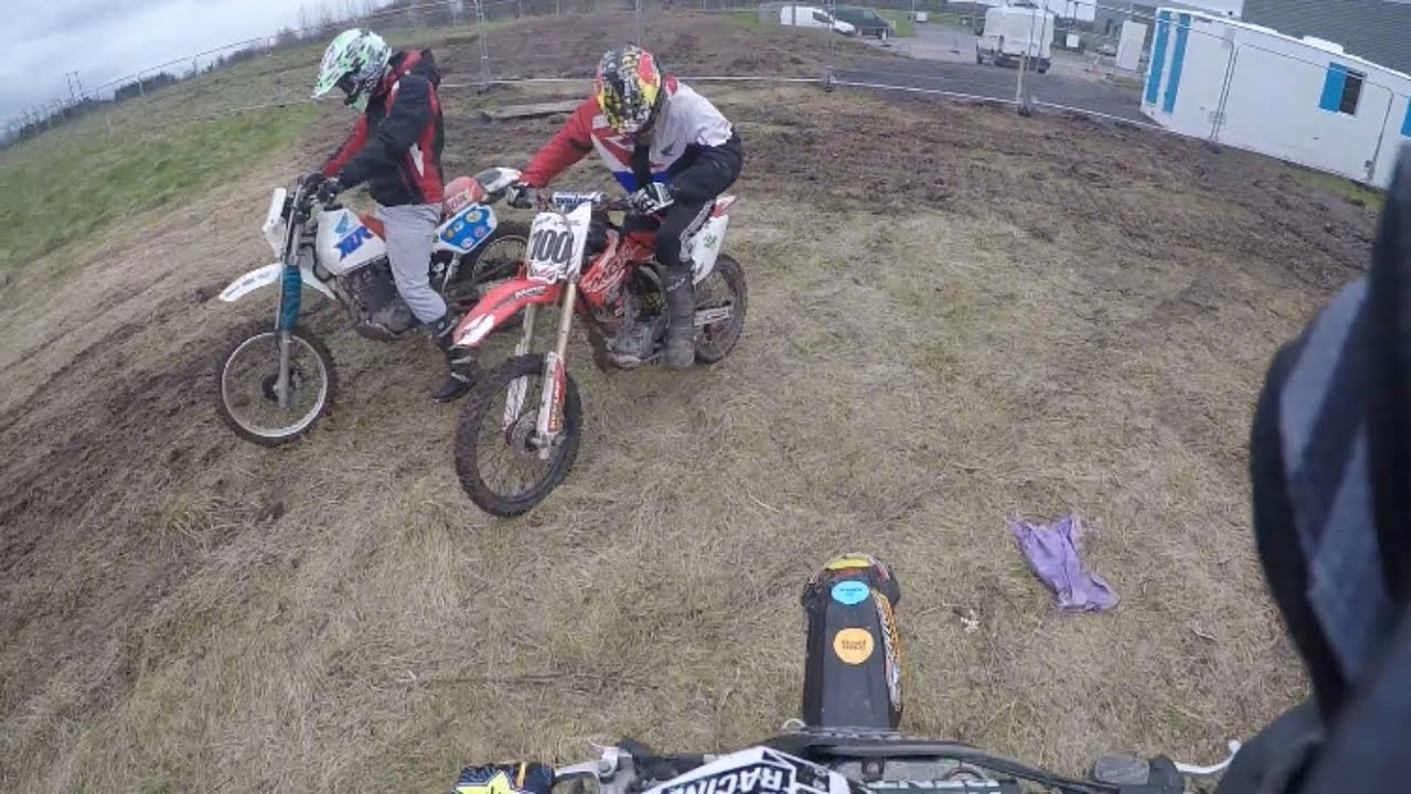 A view of two youth working away on scramblers in Dublin