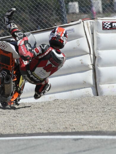 A view of the racers at MotoAmerica using the flimsy soft barriers for motorcycle accidents