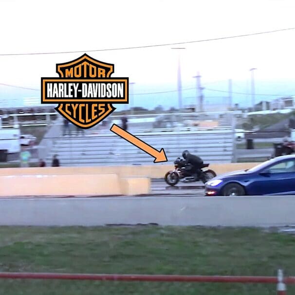 A view of a drag race between a Tesla model s plaid and a Harley-Davidson LiveWire One