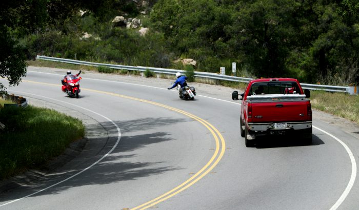 A view of motorists acknowledging each other