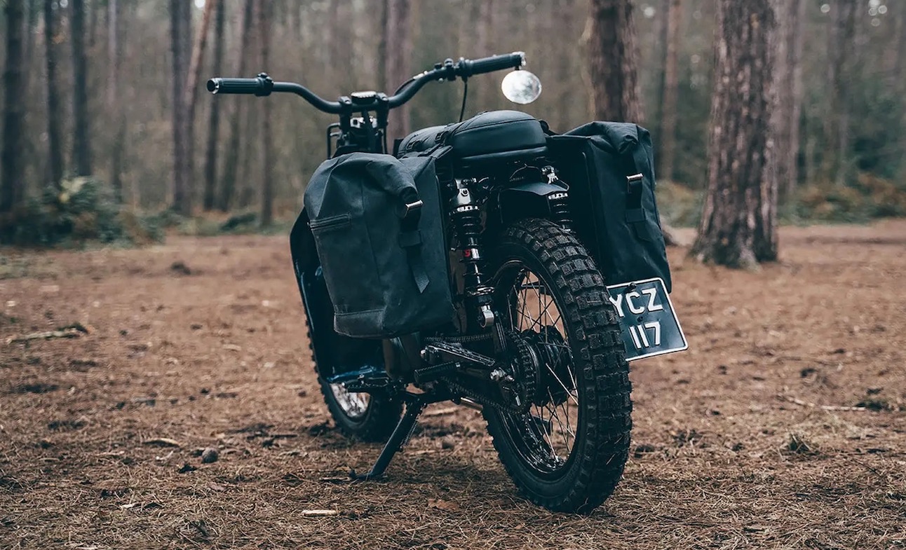 A view of a custom Honda Super Cub that has been customized by Scar's Motorcycles