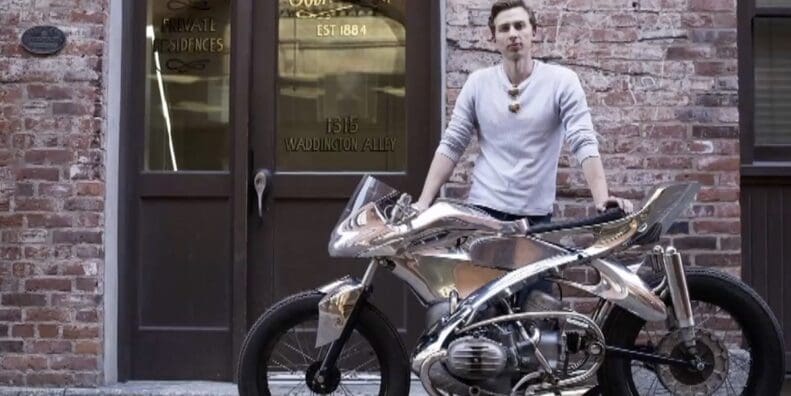 A view of Jay Donovan working on a custom bike for BMW, as per the report from CHEKNews