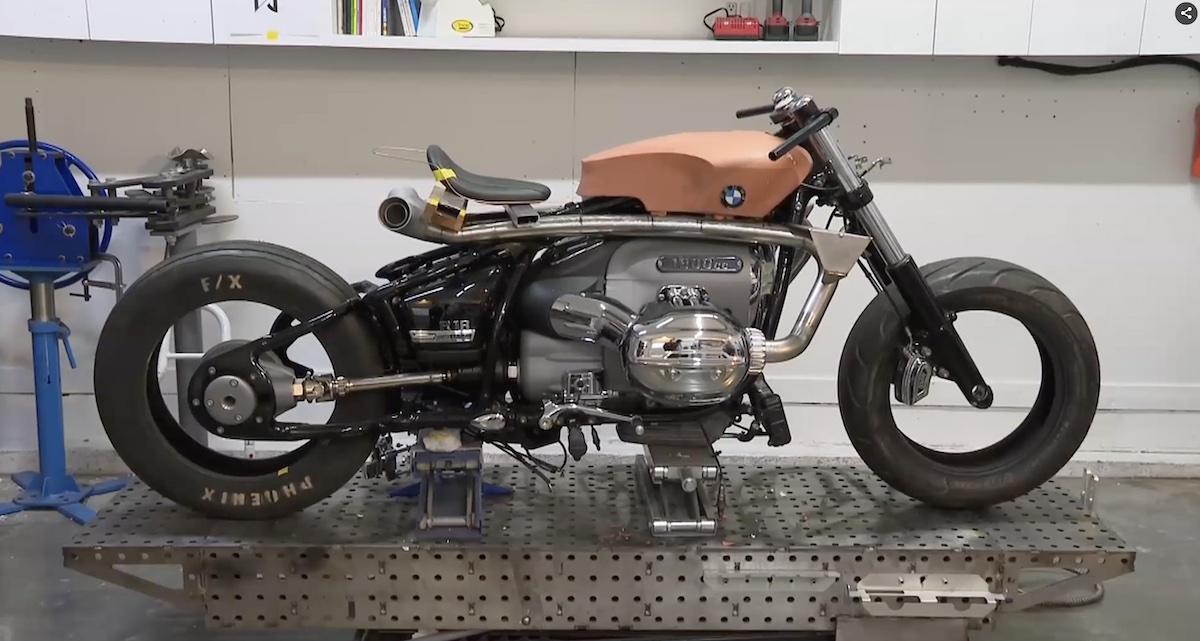 A view of Jay Donovan working on a custom bike for BMW, as per the report from CHEKNews