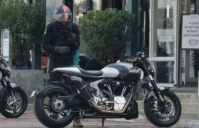 A view of Alex Winter and Keanu Reeves meeting for a cup of coffee on two arch motorcycles