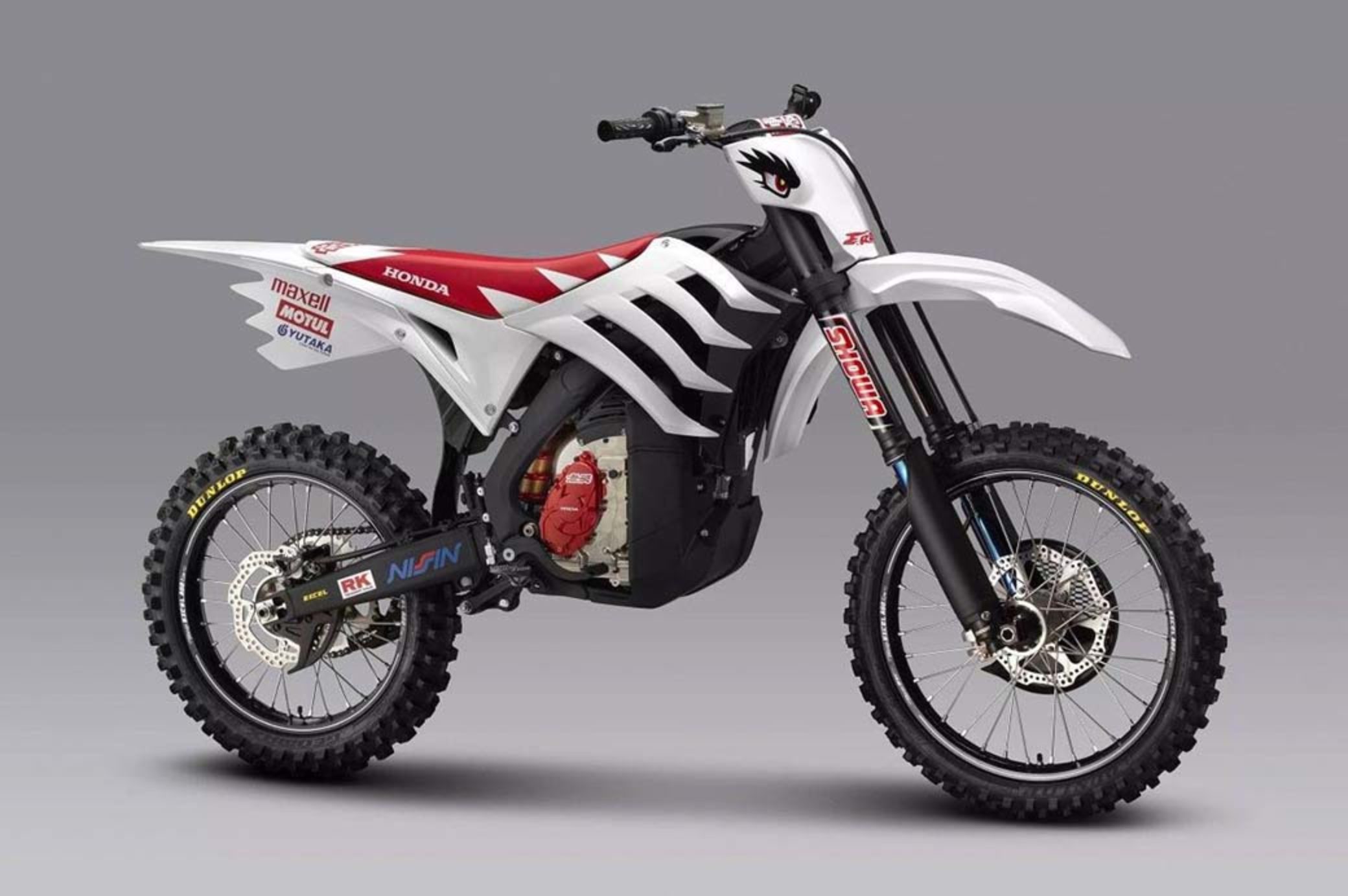 A view of off-roading motorcycles, with media used to depict the re-integration of racing team Mugen into the all-new electric off-roading series, E-Xplorer