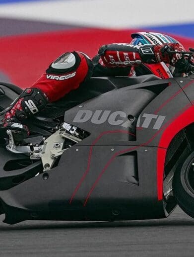 A side view of the Ducati electric prototype on the track