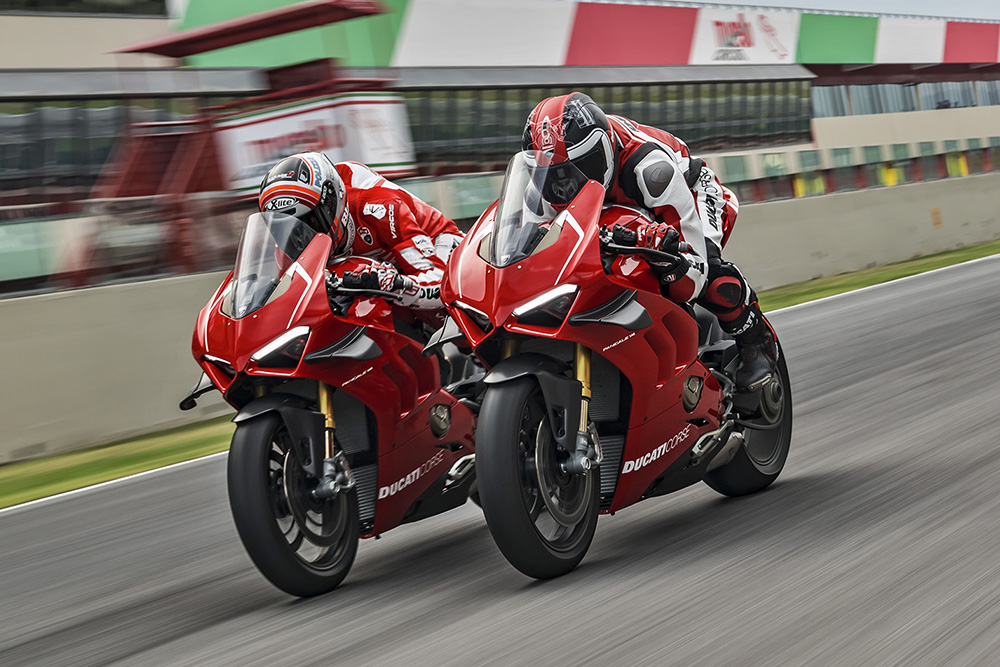 A view of two ducati machines battling it out on a track