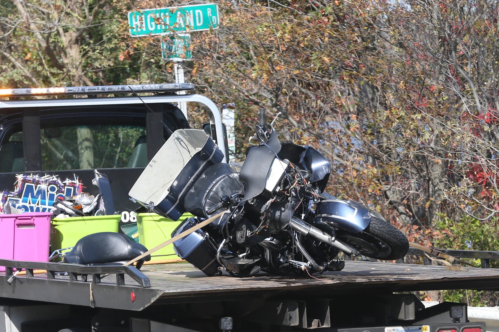 A view of a broken bike being taken to a wrecker in Boston