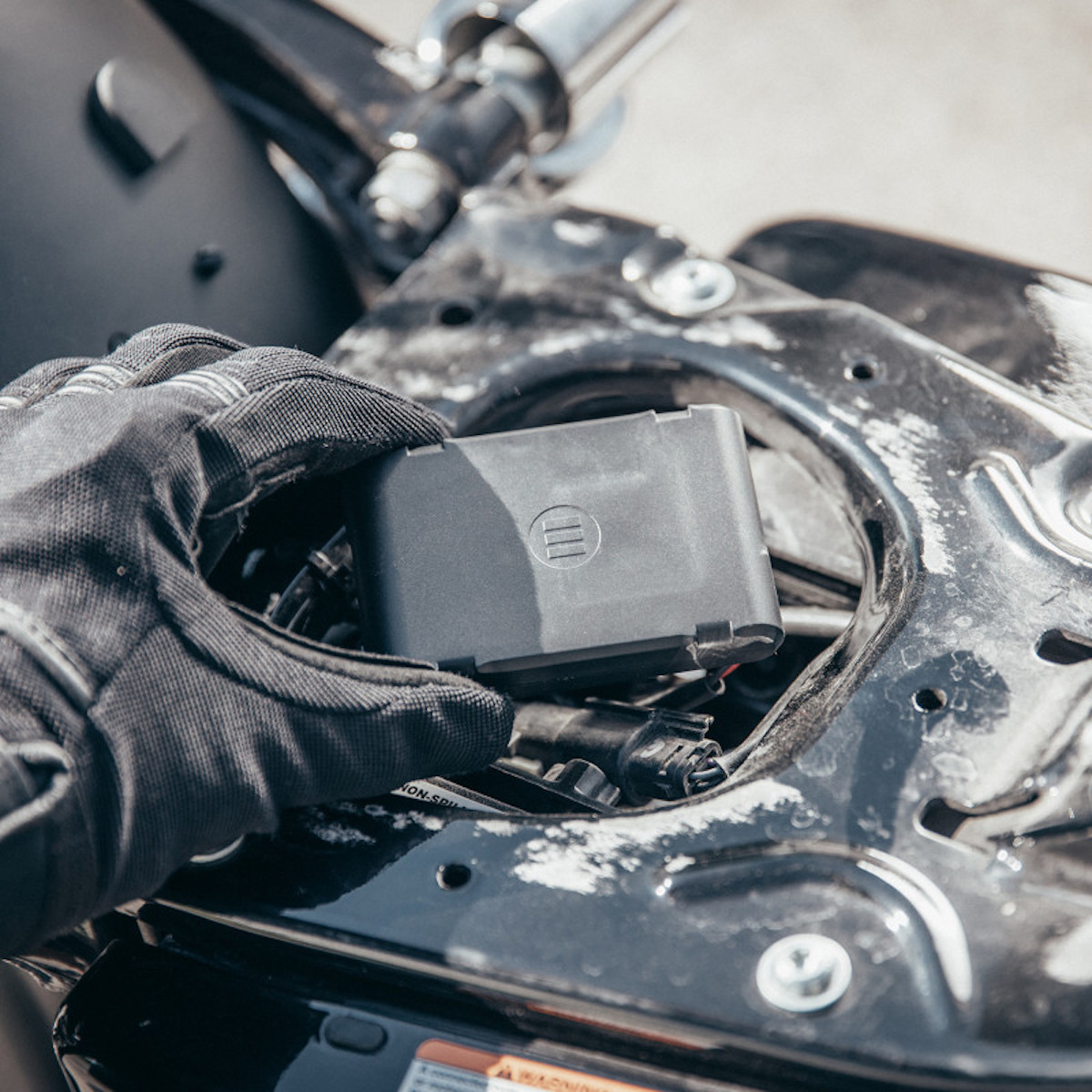 A view of the new Monimoto7 - an Anti-Theft tracking device that comes with a smart fob and app that instantly alerts you when your bike is moving