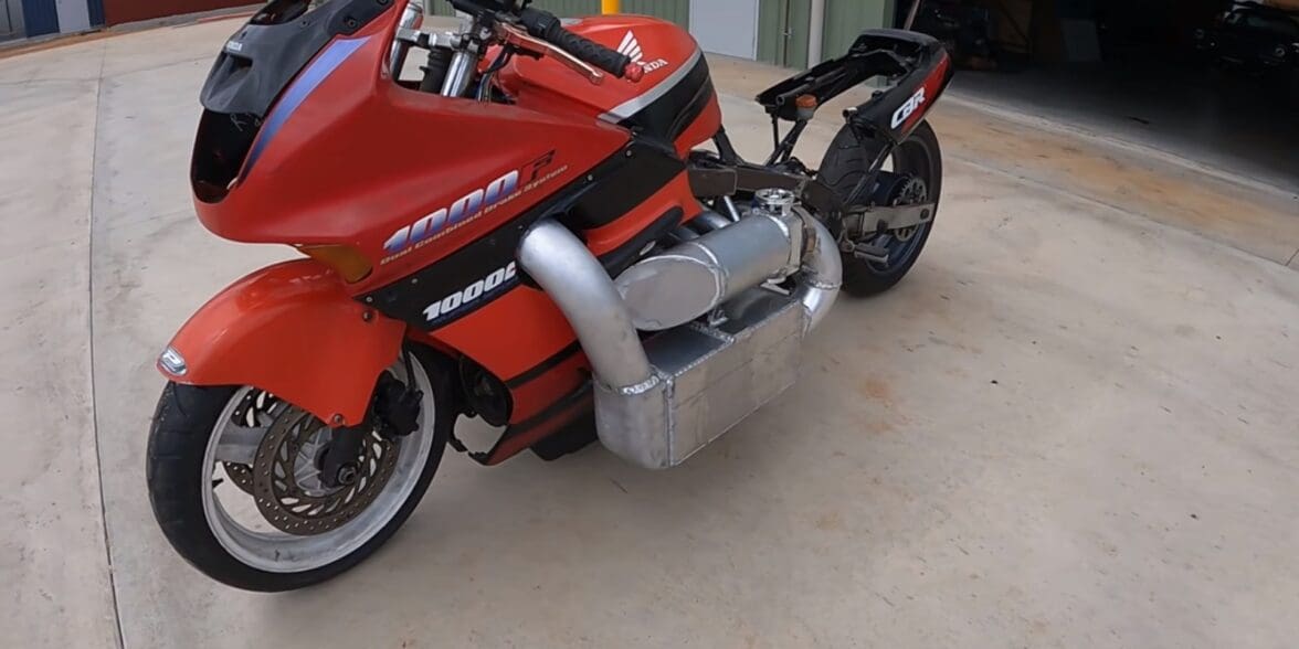 A view of a Honda CBR1000F Hurricane sporting a Honda minivan engine that's been turbo'ed