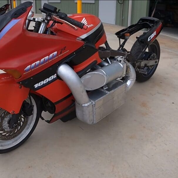 A view of a Honda CBR1000F Hurricane sporting a Honda minivan engine that's been turbo'ed