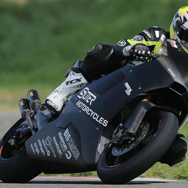 A view of an electric motorcycle in the midst of racing