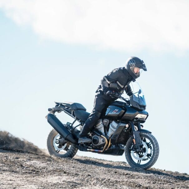 Image of a rider on a Pan America riding down an incline