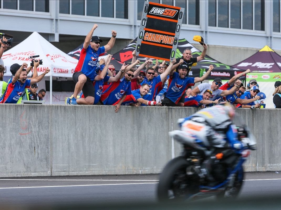 A MotoAmerica racer leaning into the twisties