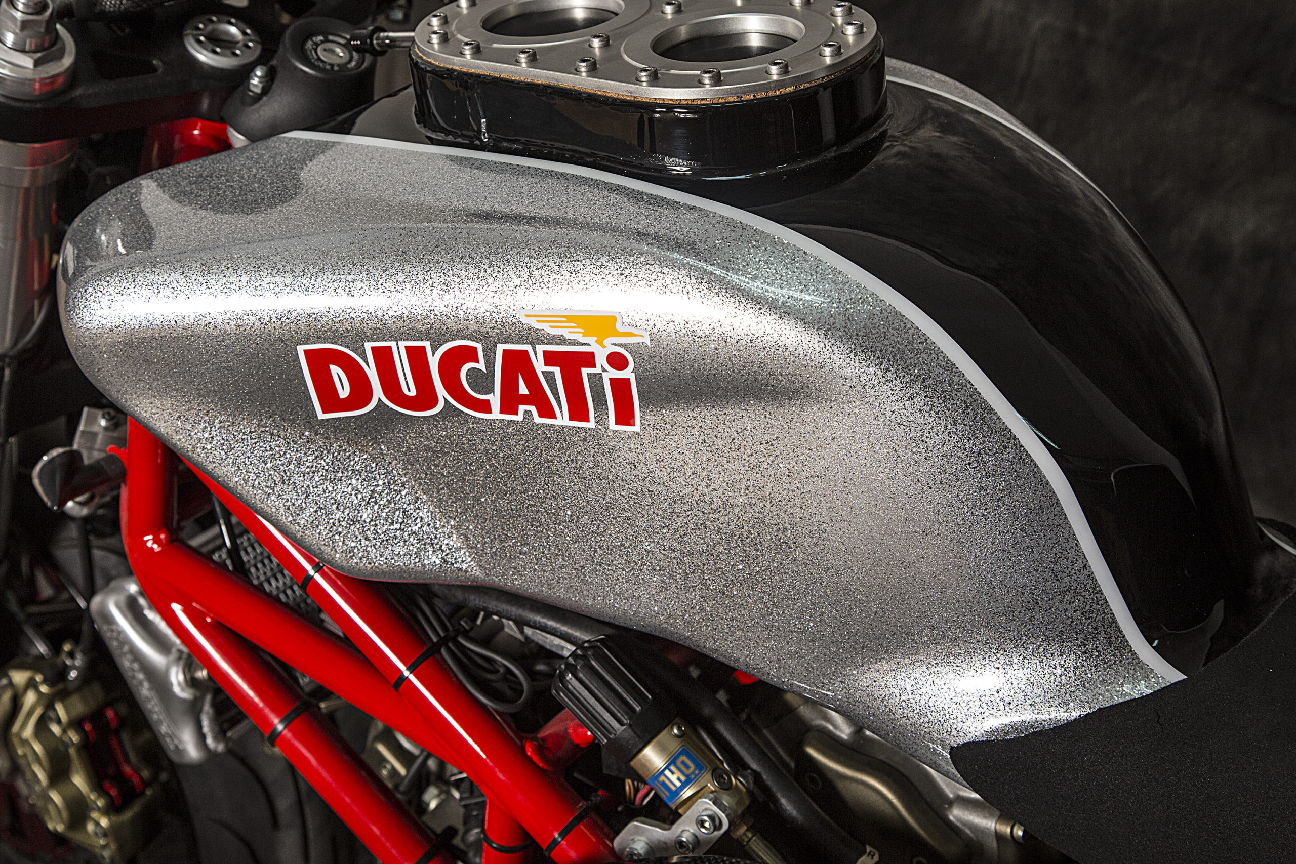 A view of the 2003 Ducati Monster 1000 courtesy of XTR Pepo that was outfitted to the extreme for both the road and the track