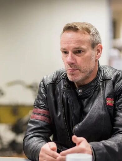 A view of Stuart Garner with his machines that he created with Norton Motorcycles