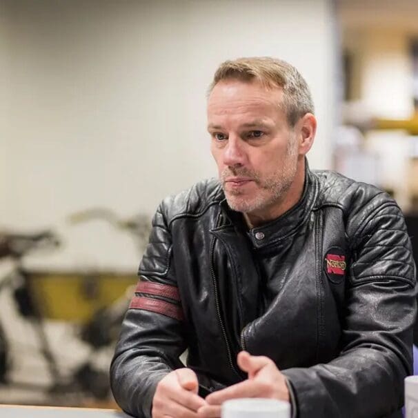 A view of Stuart Garner with his machines that he created with Norton Motorcycles