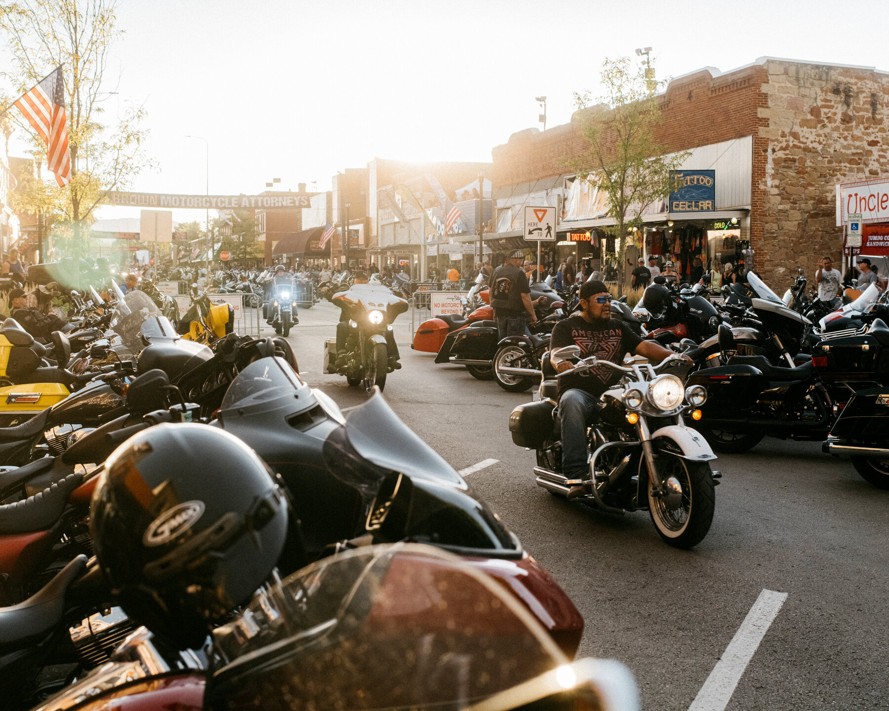 A view of a motorcycle rally that took place in 2021: Many motorcycles ride around as riders reacquaint each other post-COVID