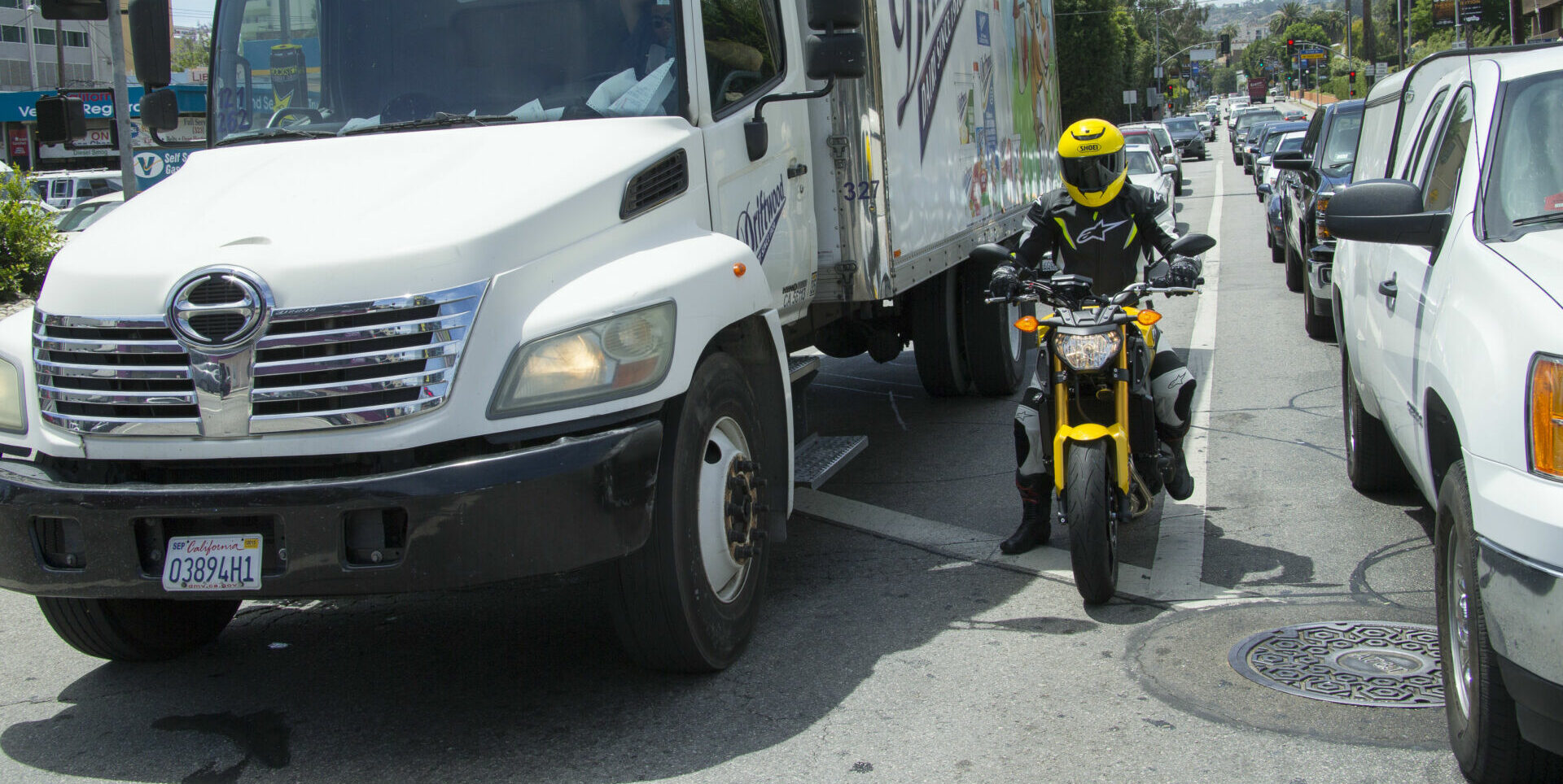 A view of motorcyclists lane splitting