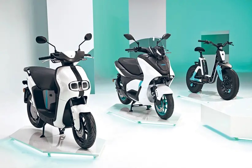 A view of the new electric lineup offered by Yamaha with focus on teh collab between yamaha and Gogoro for small-displacement electric machines set to sync up to a charging network