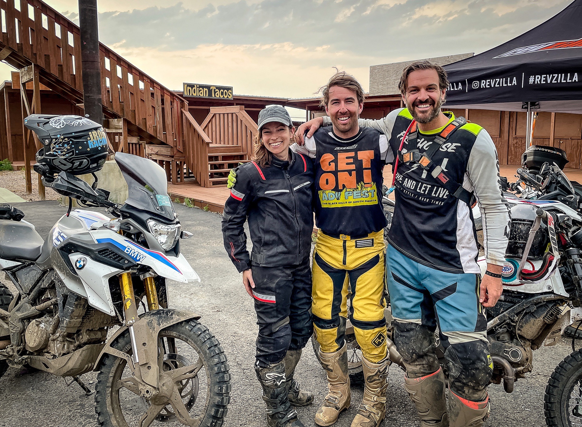Jenn Dunstan standing with Brandon Wise and Spurgeon Dunbar from RevZilla