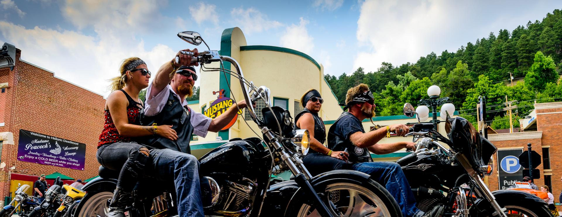 A view of a motorcycle rally that took place in 2021: Many motorcycles ride around as riders reacquaint each other post-COVID